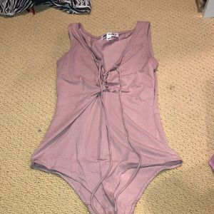 blush lace up body suit